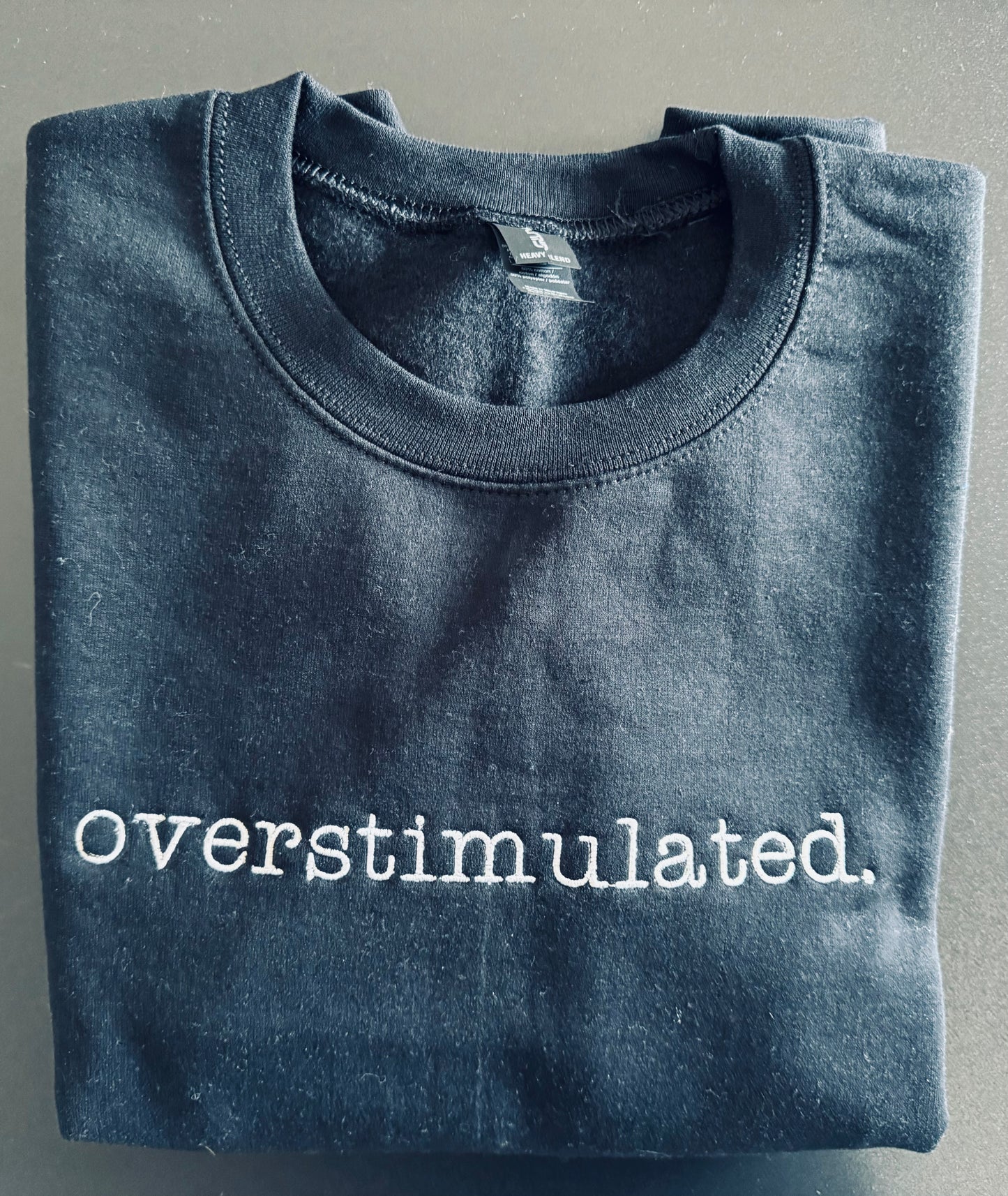 overstimulted. crew sweatshirt Embroidered Funny quote
