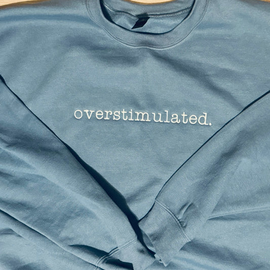 overstimulted. crew sweatshirt Embroidered Funny quote