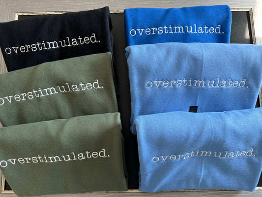 overstimulted. crew sweatshirt Embroidered Funny quote